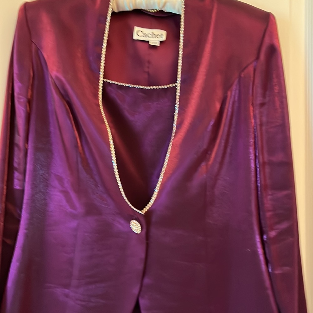 Dress with jacket. Satin material. Rhinestones details.  Slide slit